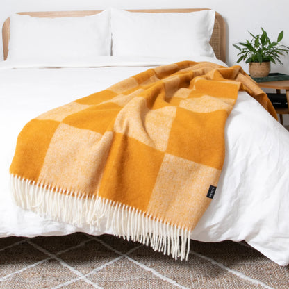 Coperta in lana fine a scacchi arancione